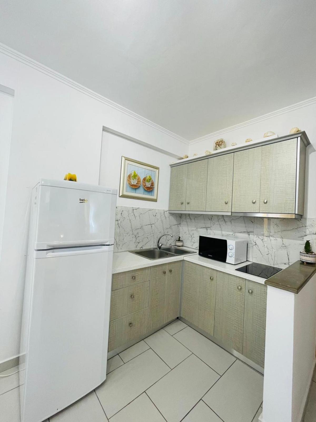 Menikos Apartments Химара Номер фото
