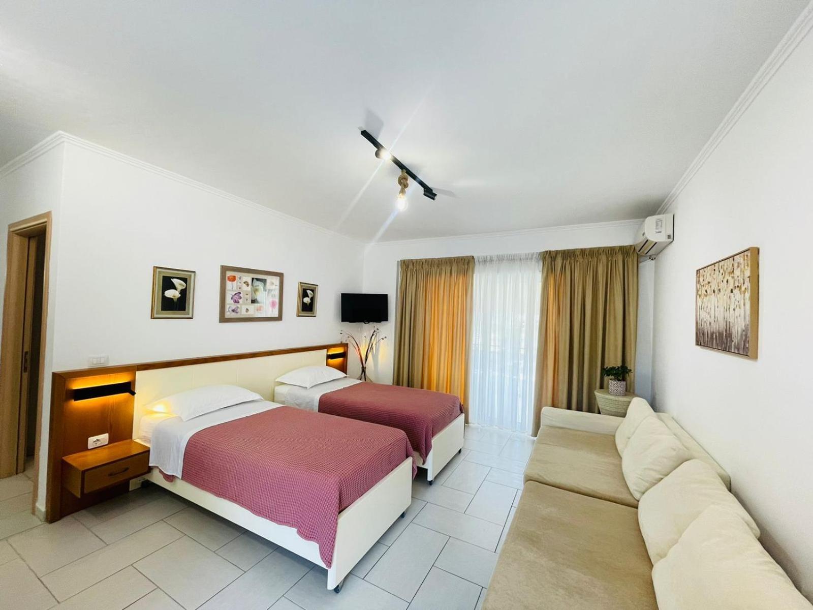 Menikos Apartments Химара Номер фото